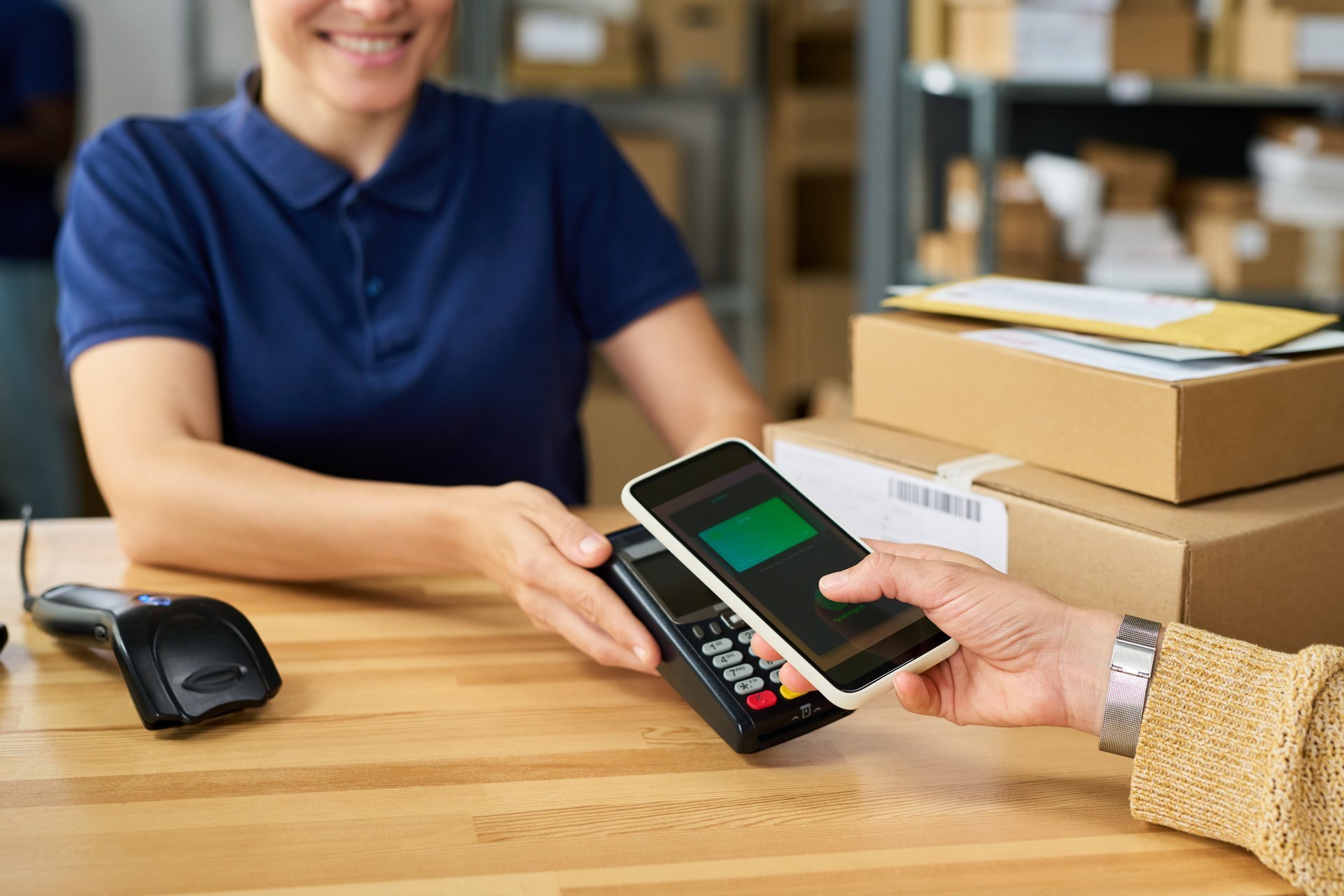 Customer making contactless payment at checkout